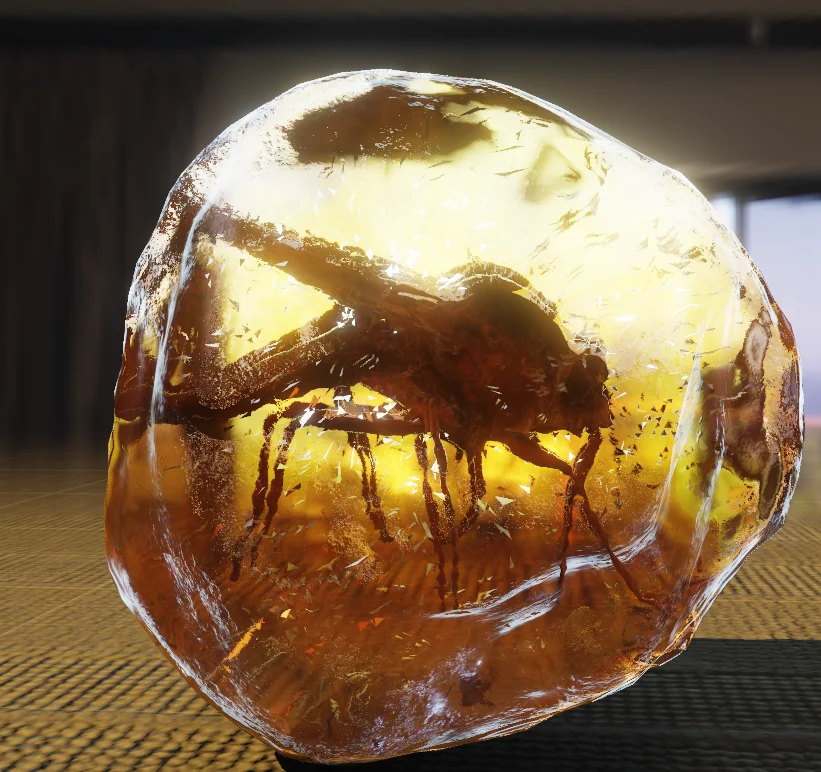 A mosquito inside a nugget of amber, lit from behind so the insect shows through.